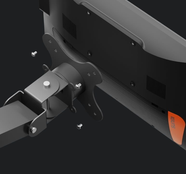 Close-up of the VESA plate and screws fixing an arm to the back of the display