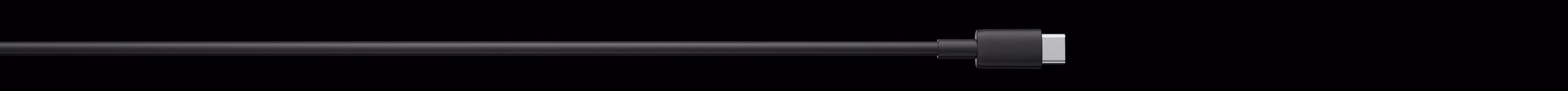 A single USB-C lead running the width of the frame on black, its connector part way along it