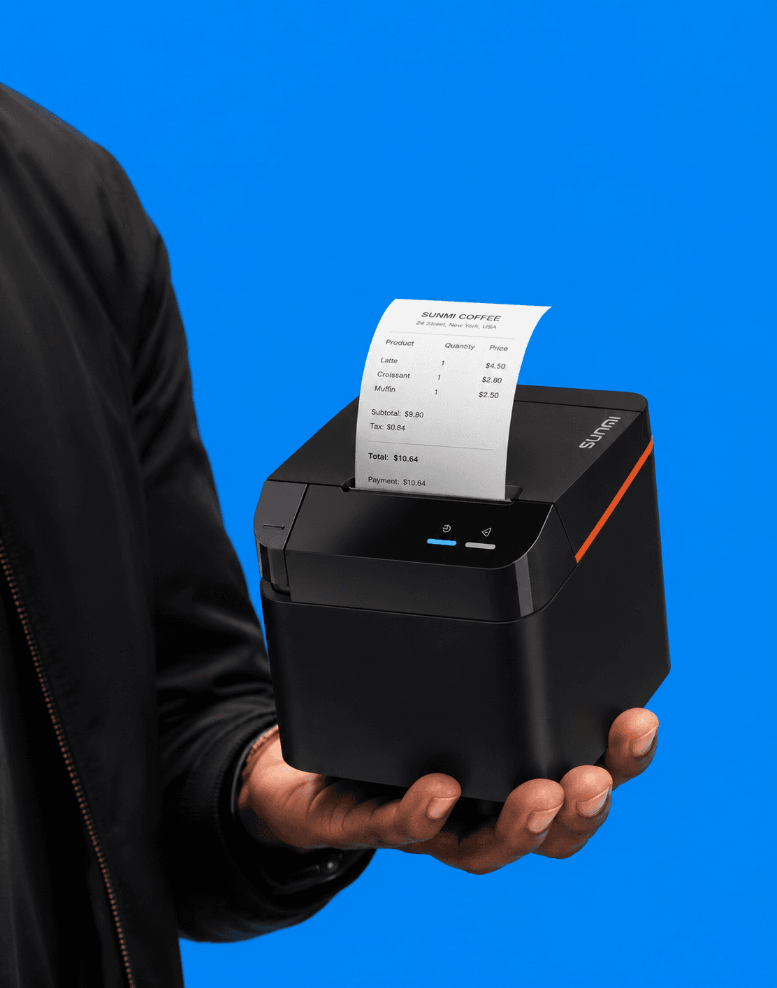 Sunmi receipt printer held in one hand, printing a customer receipt
